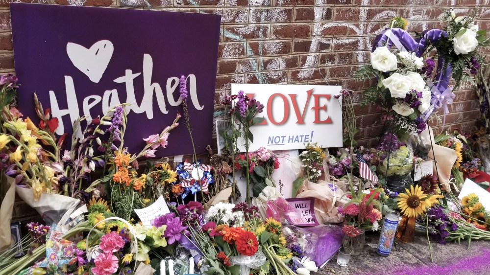 Signs to Heather Heyer on display in Charlottesville near where she was killed by a white supremacist.