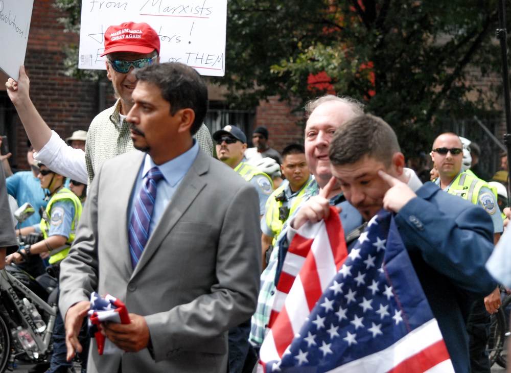 A man marches with white supremacist Jason Kessler during the Unite the Right 2 event in Washington D.C. on Sunday, Aug. 12, 2018. 